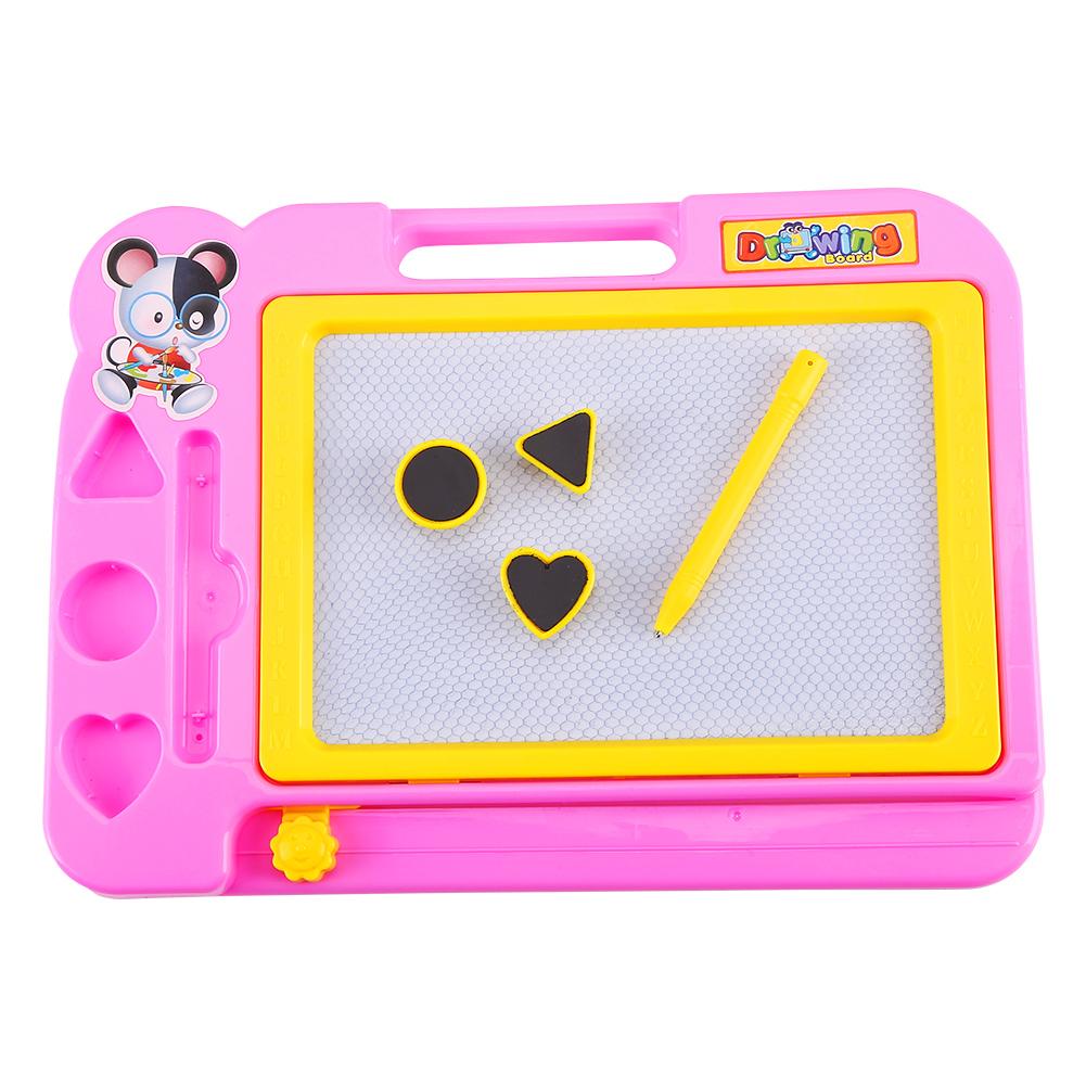 Kids using magnetic drawing board Kids using magnetic drawing board